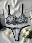 Siyah Beyaz Transparan Tangalı Sütyen Takımı resmi